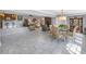 Open concept dining area with glass table and view of living room at 314 33Rd Ne Ave, St Petersburg, FL 33704