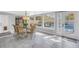 Sunlit dining area with pool view and access to patio at 314 33Rd Ne Ave, St Petersburg, FL 33704