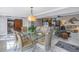 Spacious dining area with glass-top table and seating for six at 314 33Rd Ne Ave, St Petersburg, FL 33704