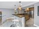 Open concept kitchen with breakfast bar and view of the living area at 314 33Rd Ne Ave, St Petersburg, FL 33704