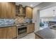 Modern kitchen with stainless steel range and updated cabinetry at 314 33Rd Ne Ave, St Petersburg, FL 33704