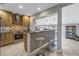 Open concept kitchen with breakfast bar and stainless steel appliances at 314 33Rd Ne Ave, St Petersburg, FL 33704
