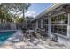 Spacious patio with seating and adjacent pool at 314 33Rd Ne Ave, St Petersburg, FL 33704