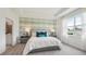 Serene bedroom with en-suite bathroom and wall-to-wall carpeting at 32674 Rustic Rise Rd, San Antonio, FL 33576