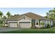 Two-story home with three-car garage, landscaped yard, and attractive exterior at 32710 Rustic Rise Rd, San Antonio, FL 33576