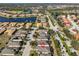 Aerial view highlighting home's location near lake at 335 Siena Vista Pl, Sun City Center, FL 33573