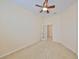 Bright bedroom with ceiling fan and carpeted floor at 335 Siena Vista Pl, Sun City Center, FL 33573