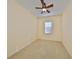 Bedroom with ceiling fan and window with blinds at 335 Siena Vista Pl, Sun City Center, FL 33573