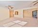Open living room showcasing views into the kitchen and dining areas at 335 Siena Vista Pl, Sun City Center, FL 33573