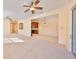 Open living area with views into the kitchen and dining area at 335 Siena Vista Pl, Sun City Center, FL 33573