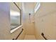 Walk-in shower with grab bars and tiled walls at 335 Siena Vista Pl, Sun City Center, FL 33573