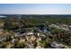Aerial view of a home with waterway access and beautiful surrounding landscaping at 346 80Th Ne Ave, St Petersburg, FL 33702