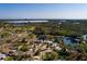 Aerial view of a waterfront neighborhood surrounded by lush landscapes at 346 80Th Ne Ave, St Petersburg, FL 33702
