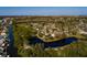 Beautiful waterfront lot with mature trees and a tranquil pond, offering picturesque views and privacy at 346 80Th Ne Ave, St Petersburg, FL 33702