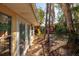 Backyard featuring patio, mature trees, and a play area at 346 80Th Ne Ave, St Petersburg, FL 33702