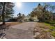 Charming two-story home with a well-maintained lawn and ample parking space at 346 80Th Ne Ave, St Petersburg, FL 33702