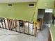 An interior living space undergoing renovations, featuring tile flooring with visible studs, and access to bathroom at 346 80Th Ne Ave, St Petersburg, FL 33702