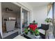 Relaxing balcony with patio furniture and view of living room at 3824 37Th S St # 67, St Petersburg, FL 33711