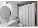 Clean bathroom with a shower/tub combo and white vanity at 3824 37Th S St # 67, St Petersburg, FL 33711