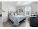 Spacious bedroom with a dresser and home office area at 3824 37Th S St # 67, St Petersburg, FL 33711