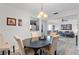 Bright dining room with table and view of living room at 3824 37Th S St # 67, St Petersburg, FL 33711