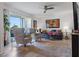 Living room with hardwood floors and access to balcony at 3824 37Th S St # 67, St Petersburg, FL 33711
