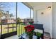 Relaxing screened patio with seating and vibrant plants at 3824 37Th S St # 67, St Petersburg, FL 33711