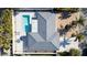 Backyard with swimming pool and patio at 4523 Clearwater Harbor S Dr, Largo, FL 33770