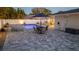 Backyard featuring a patio with an umbrella table, lounge chairs and a sparkling pool at 4523 Clearwater Harbor S Dr, Largo, FL 33770