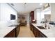 Bright kitchen with stainless steel appliances, and quartz countertops at 4523 Clearwater Harbor S Dr, Largo, FL 33770