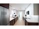 Spacious kitchen featuring modern appliances, dual sinks, and ample counter space at 4523 Clearwater Harbor S Dr, Largo, FL 33770