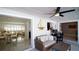 Living area featuring contemporary decor, ceiling fan and a glimpse into the dining room and office at 4523 Clearwater Harbor S Dr, Largo, FL 33770