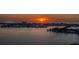 Beautiful sunset view of the tranquil bay, offering a glimpse of the idyllic community nearby at 4523 Clearwater Harbor S Dr, Largo, FL 33770