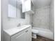 Clean bathroom, featuring a bathtub and white vanity at 4720 Grace N St, St Petersburg, FL 33714