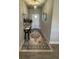 Bright entryway with tile flooring, console table, and stylish rug at 493 Omen St, Punta Gorda, FL 33982