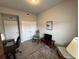 Versatile home office or guest room with built-in shelving at 493 Omen St, Punta Gorda, FL 33982