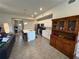 Open kitchen with island, stainless steel appliances, and ample cabinet space at 493 Omen St, Punta Gorda, FL 33982