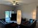Relaxing living room with comfy seating and sliding glass doors at 493 Omen St, Punta Gorda, FL 33982