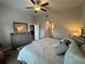 Main bedroom with king size bed and ensuite bathroom access at 493 Omen St, Punta Gorda, FL 33982