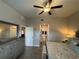 Spacious main bedroom with large bed, dresser, and ceiling fan at 493 Omen St, Punta Gorda, FL 33982