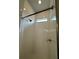 Clean shower with tile surround and a window for natural light at 493 Omen St, Punta Gorda, FL 33982