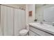 Clean bathroom with shower/tub combo and updated vanity at 5322 Fiddle Fig Ave, Wimauma, FL 33598
