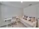 Small bedroom featuring a desk and couch at 5322 Fiddle Fig Ave, Wimauma, FL 33598