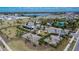 Aerial view of community amenities including basketball and pickleball courts, playground, and pool at 5322 Fiddle Fig Ave, Wimauma, FL 33598