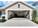 Garage with open door, showing gym inside at 5322 Fiddle Fig Ave, Wimauma, FL 33598