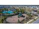 Aerial view of a playground with swings and climbing structures at 5322 Fiddle Fig Ave, Wimauma, FL 33598