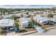 Birds-eye view of the property in a quiet neighborhood, featuring well-maintained landscaping and nearby amenities at 5539 Regal Way, Zephyrhills, FL 33541
