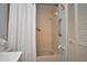 Bathroom with shower/tub combo and linen closet at 5565 Salem Square N Dr, Palm Harbor, FL 34685