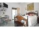 Bedroom with wicker bed frame, writing desk, and patio access at 5565 Salem Square N Dr, Palm Harbor, FL 34685