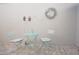 Private patio with bistro table and chairs at 5565 Salem Square N Dr, Palm Harbor, FL 34685